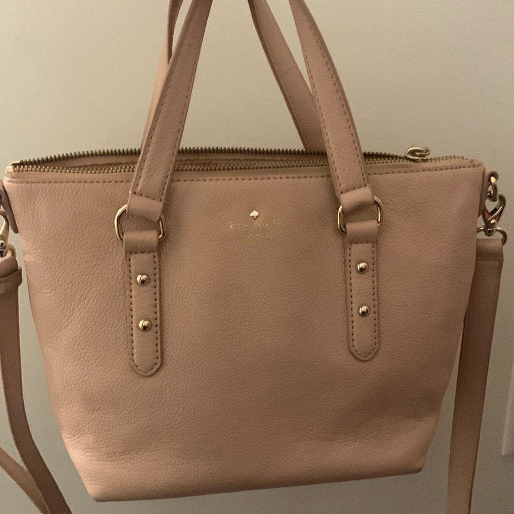 Baby pink Kate spade purse.